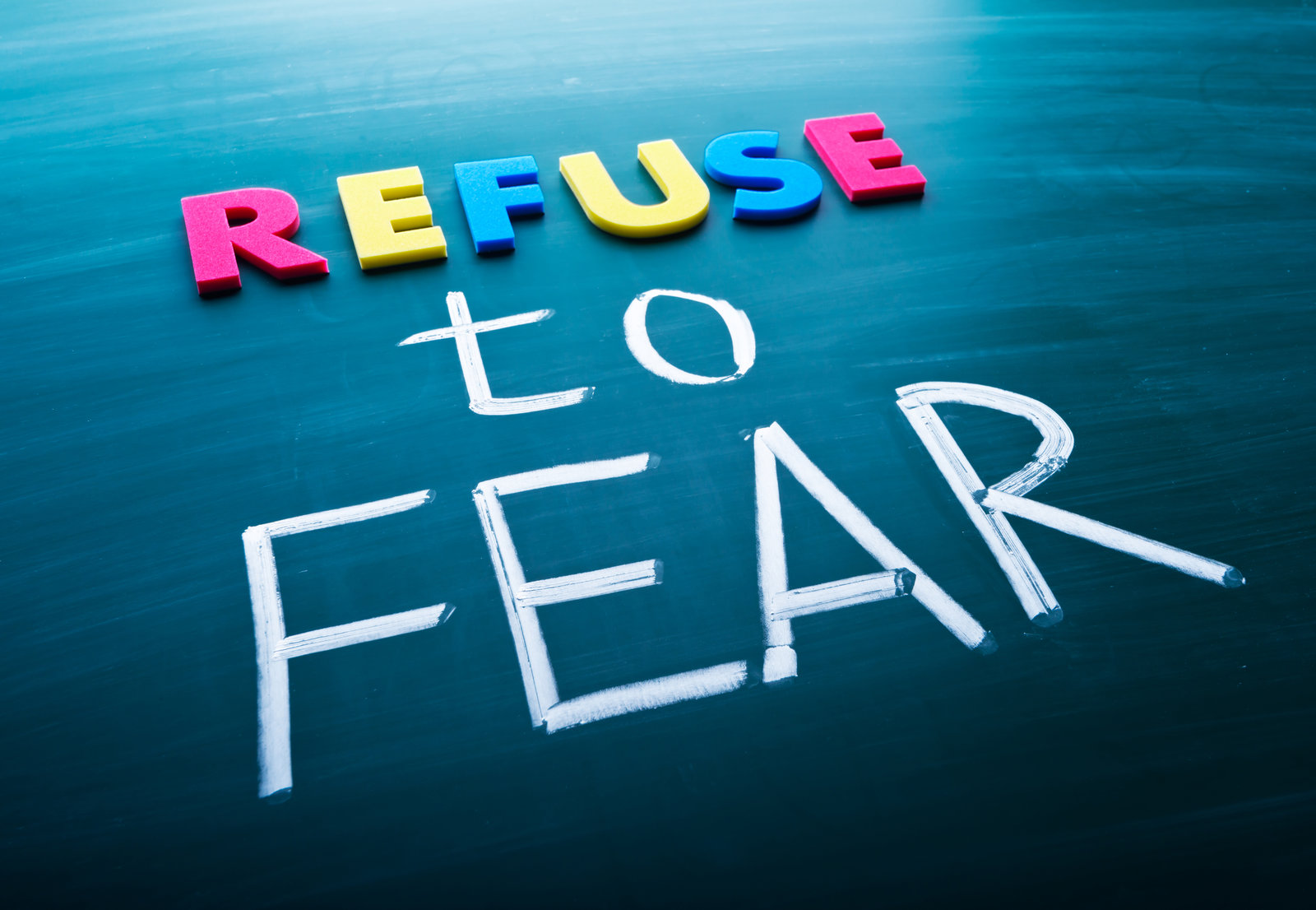 styled image of text "refuse to fear".