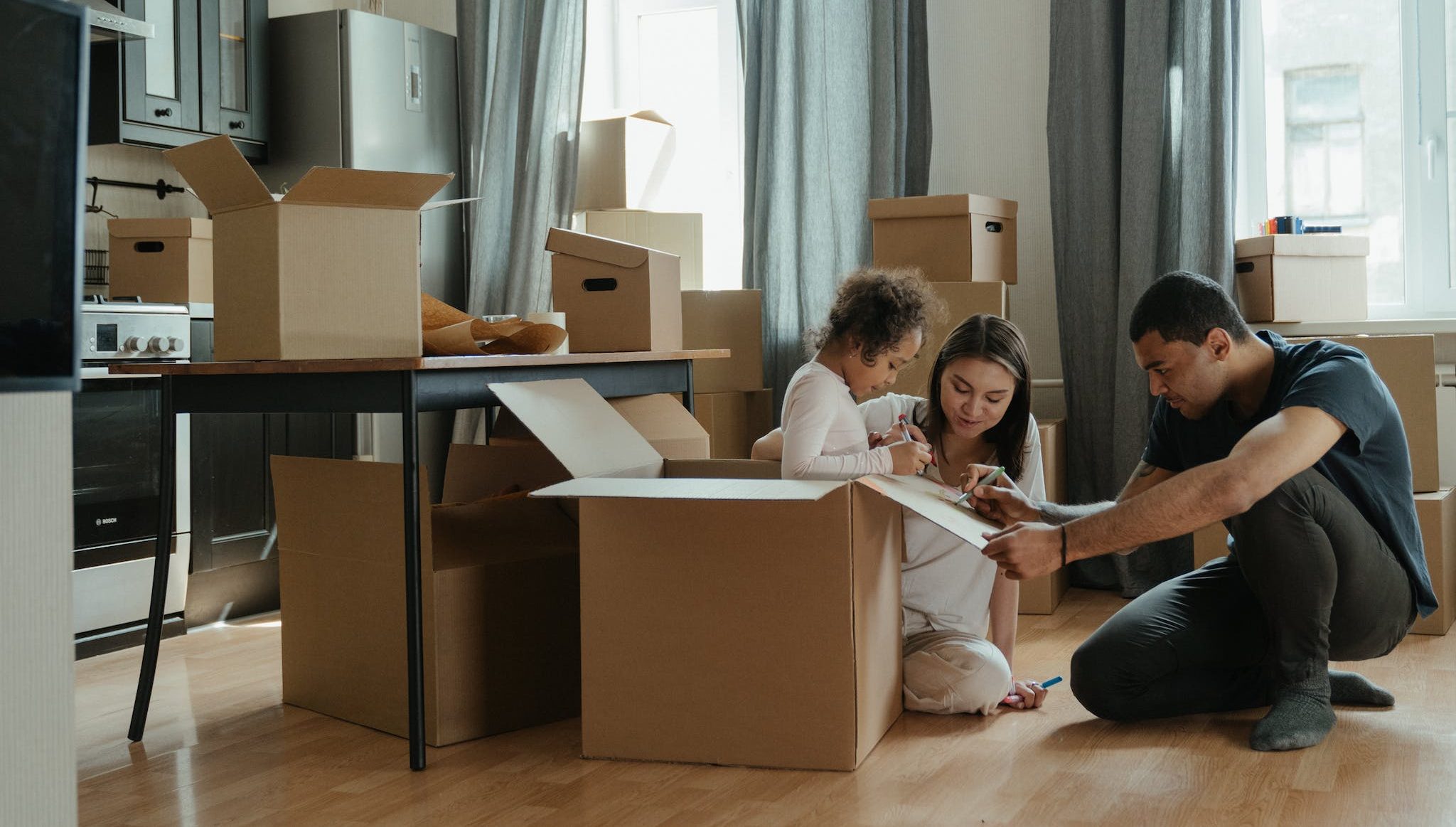 Family Unpacking After Moving.